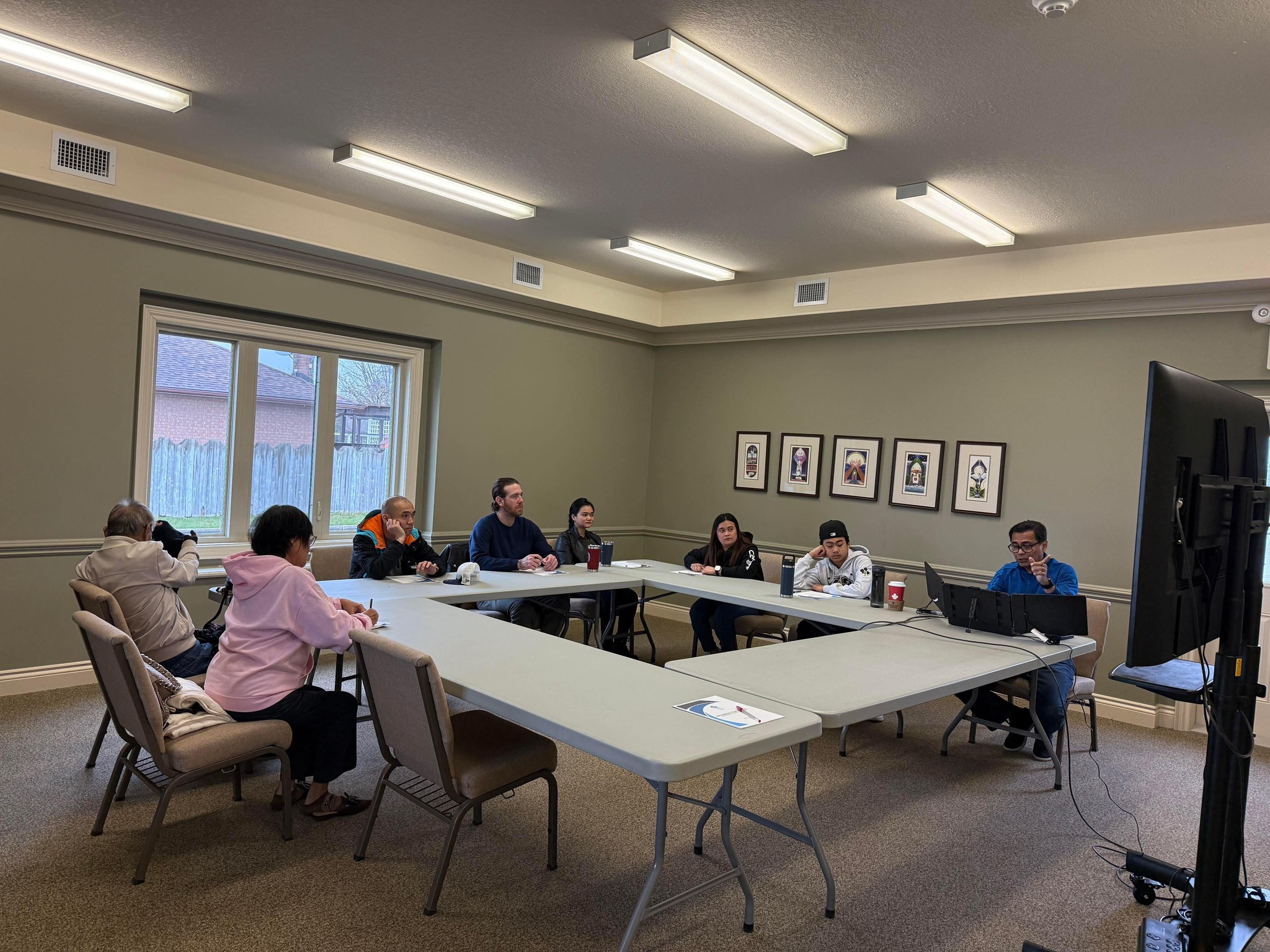 Bible study discussion group around tables